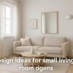 A minimalist small living room with light beige walls, a two-seater sofa, a wooden round coffee table, a large wall mirror, and simple decor that enhances natural light, creating a spacious and airy feel.