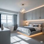 Modern bright bedroom with ambient lighting, natural light and neutral colors