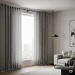 Modern grey ripple fold curtains in a minimalist living room with neutral tones and city view through a large window.