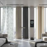 Modern curtain designs 2026 showcasing minimalist, patterned, and neutral-colored curtains in a contemporary living room with large windows and city view.